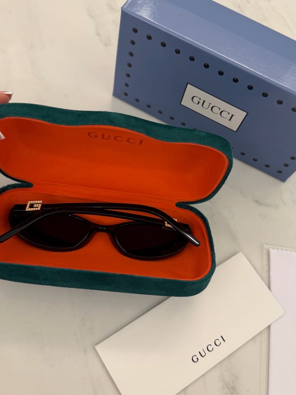 Gucci Black Oval Women's Sunglasses with Dark Lenses